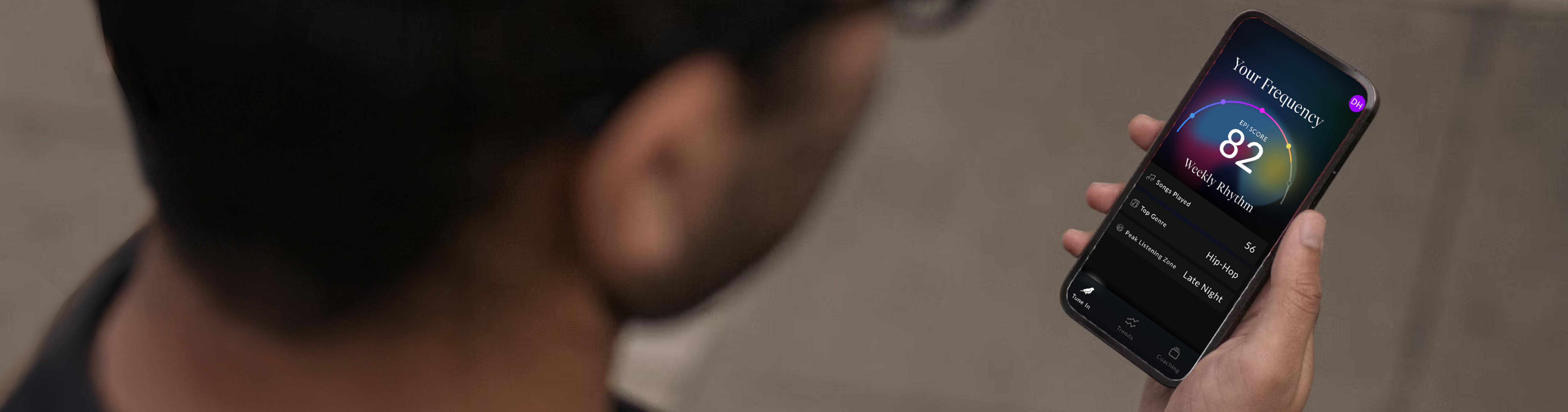 Athlete from behind viewing their EPI Score 82 on a phone